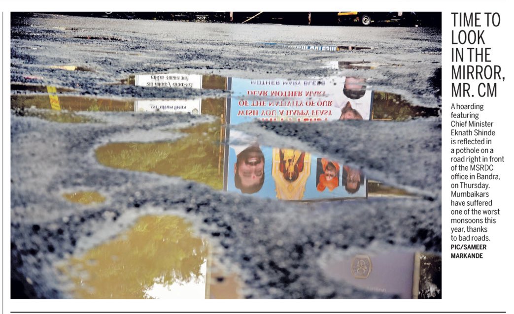 Time To Look In The Mirror, Mr CM: A hoarding featuring @mieknathshinde is reflected in a #POTHOLE on a road right in front of the #MSRDC office in #Bandra on Thursday. Mumbaikars have suffered one of the worst monsoons this year, thanks to bad #roads.