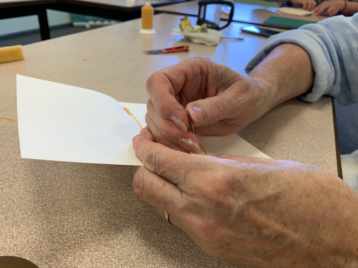 CreativeCallig's tweet photo. It was my Friday group’s turn to get stitching with @yvettejaa today as we continue our #bookbinding sessions. We’re taking inspiration this term from the Lindisfarne Gospels currently on show at the @LaingArtGallery in Newcastle. #calligraphy https://t.co/zKaT2nfJ8x