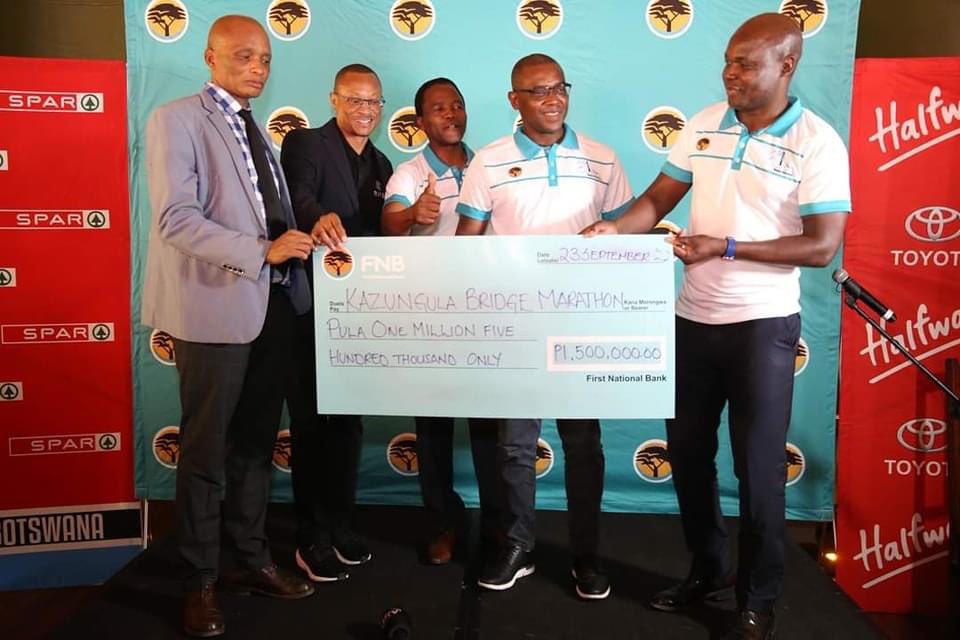 FNBKBM's tweet photo. The Kazungula Bridge Marathon this morning held a sponsorship reveal session in Kasane to announce the sponsors for KBM 2023. We are happy to confirm that FNB remains the title sponsor and the 2023 edition will once again be FNB Kazungula Bridge Marathon. https://t.co/x9YtHFt1e5