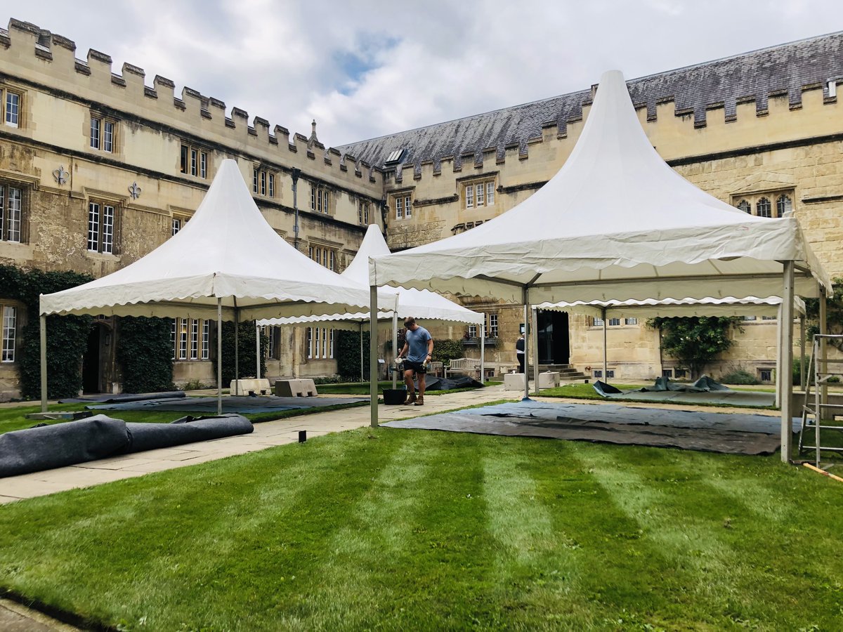 JesusOxford's tweet photo. Marquees in First Quad & an office full of gowns can only mean one thing - a Jesus graduation ceremony is imminent. We're looking forward to welcoming over 200 graduands back to College tomorrow to receive their degrees - we can't wait to see you all again! #subfusc #bleedgreen https://t.co/ekkgfQOFKa