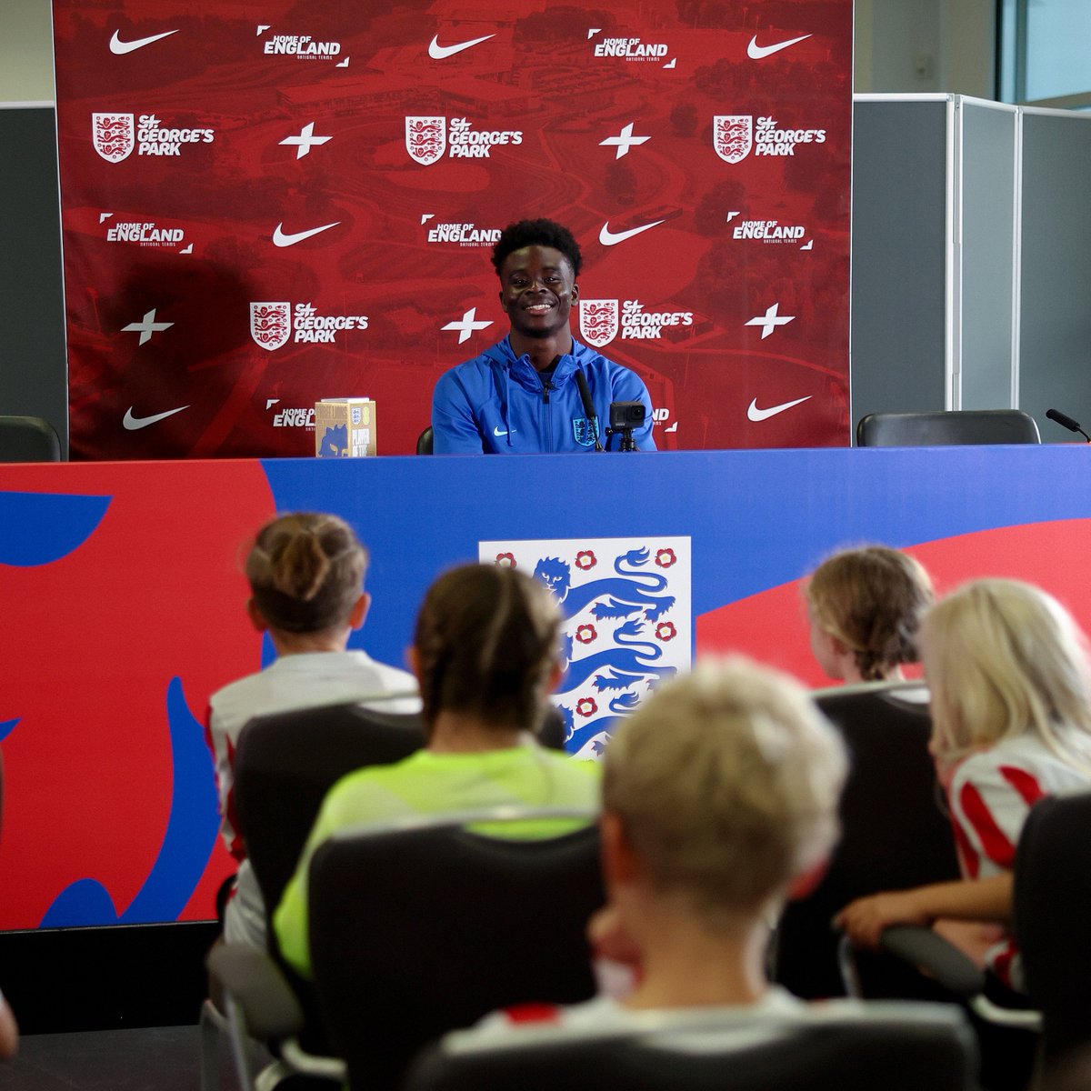 England's tweet photo. A local grassroots team presented @BukayoSaka87 with the trophy, before a Q&amp;A session and a few photos ❤️ https://t.co/hSgW6pFrkz