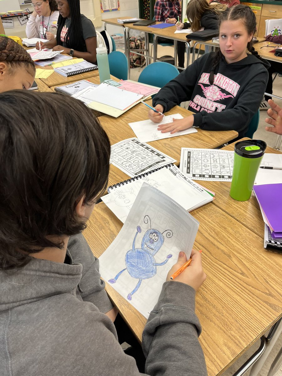 sra_hongell's tweet photo. #Spanish1 @RebelsSHHS drawing some monsters. Then yesterday, they practiced colors, numbers, shapes & body parts while describing their monster in the #TL to their group. Classmates had to use their active listening skills to draw what they heard! #monsterlife #languageisfun https://t.co/JafBJecvEb