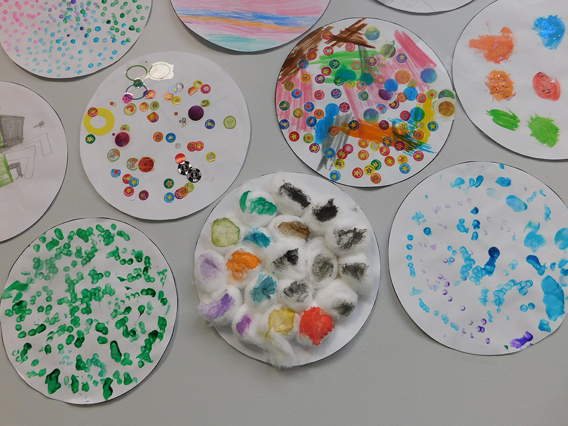 The Wyoming campus staff shared a book with students called "The Dot" by Peter Reynolds, which focuses on creativity, courage &amp; collaboration. This helped students develop reading skills, &amp; taught them to embrace their own uniqueness and creativity in making their own "dot."