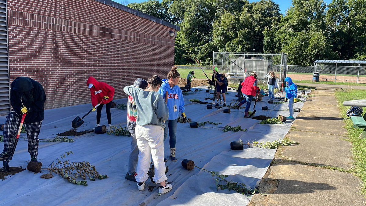 GenesisWPS's tweet photo. Genesis planting rain garden drain at Middlebrook School https://t.co/gB0PnWLYl9