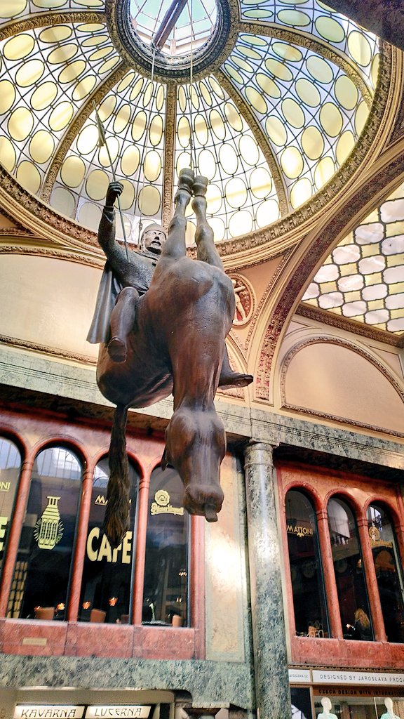 OctophinDigital's tweet photo. Rowan and Cris have been provided with a self guided tour of Prague by our benevolent captain. Let's see how we do! First stop: art deco arcade with upside down horse... https://t.co/K3tUxg1oqj