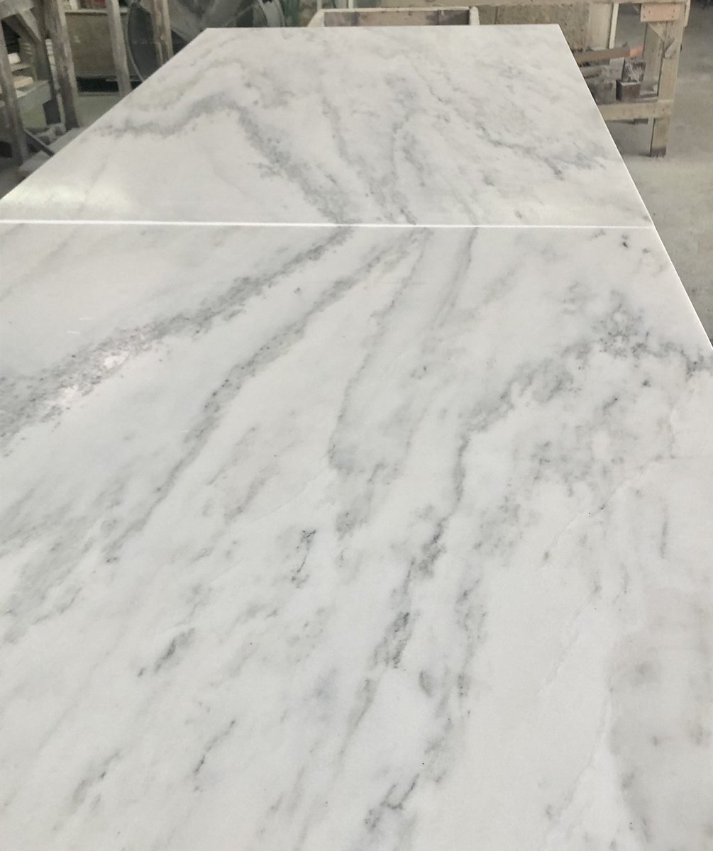 marbleandgranit's tweet photo. The look of two book-matched marble slabs never gets old👀….like these two slabs of @vermontquarries Honed Olympian White Marble for a 14’ long x 56” deep kitchen Island Top! #UseNaturalStone @MarbleInstitute @KBtribechat @thenkba https://t.co/4R2wXcokKz