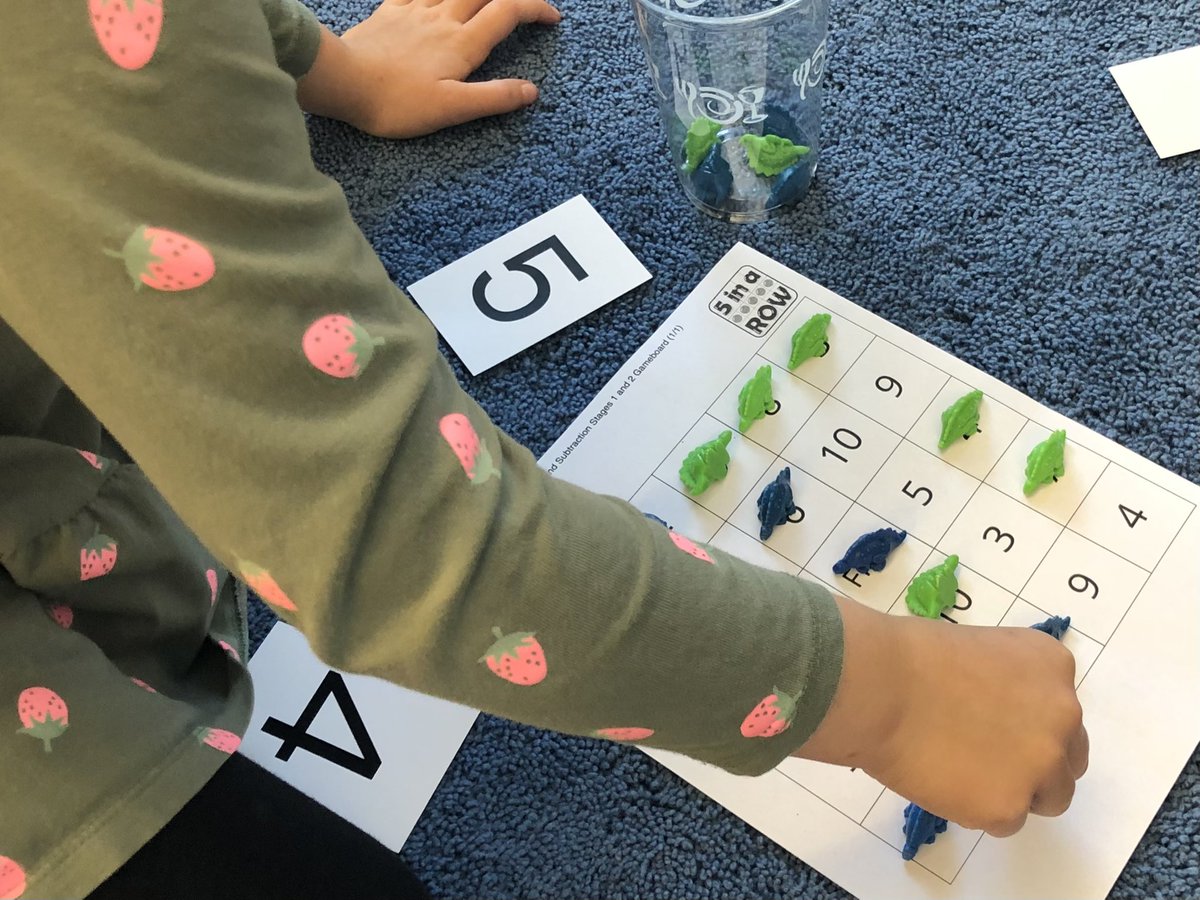 dahazel77's tweet image. Ms. Tarantino’s 1st graders were playing @IllustrateMath’s Five in a Row today by adding 1 or 2.