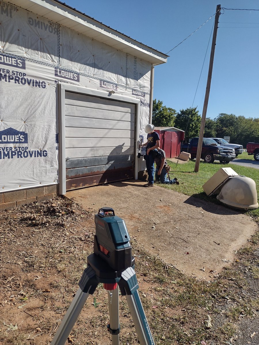 GSTCBuilder's tweet photo. Seniors working with the laser level to get the corners exactly right! Good job team! https://t.co/kpCEJQYBw1