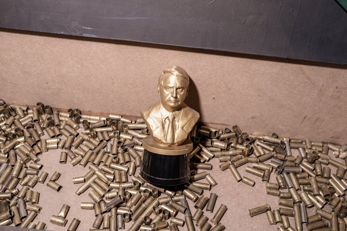 tomprotti's tweet photo. A statuette of Bolsonaro awarded as a prize in a shooting competition. An image taken in Rio de Janeiro reporting on the campaign trail ahead of Brazil’s elections for Monocle mag. https://t.co/6zTE1e17sF