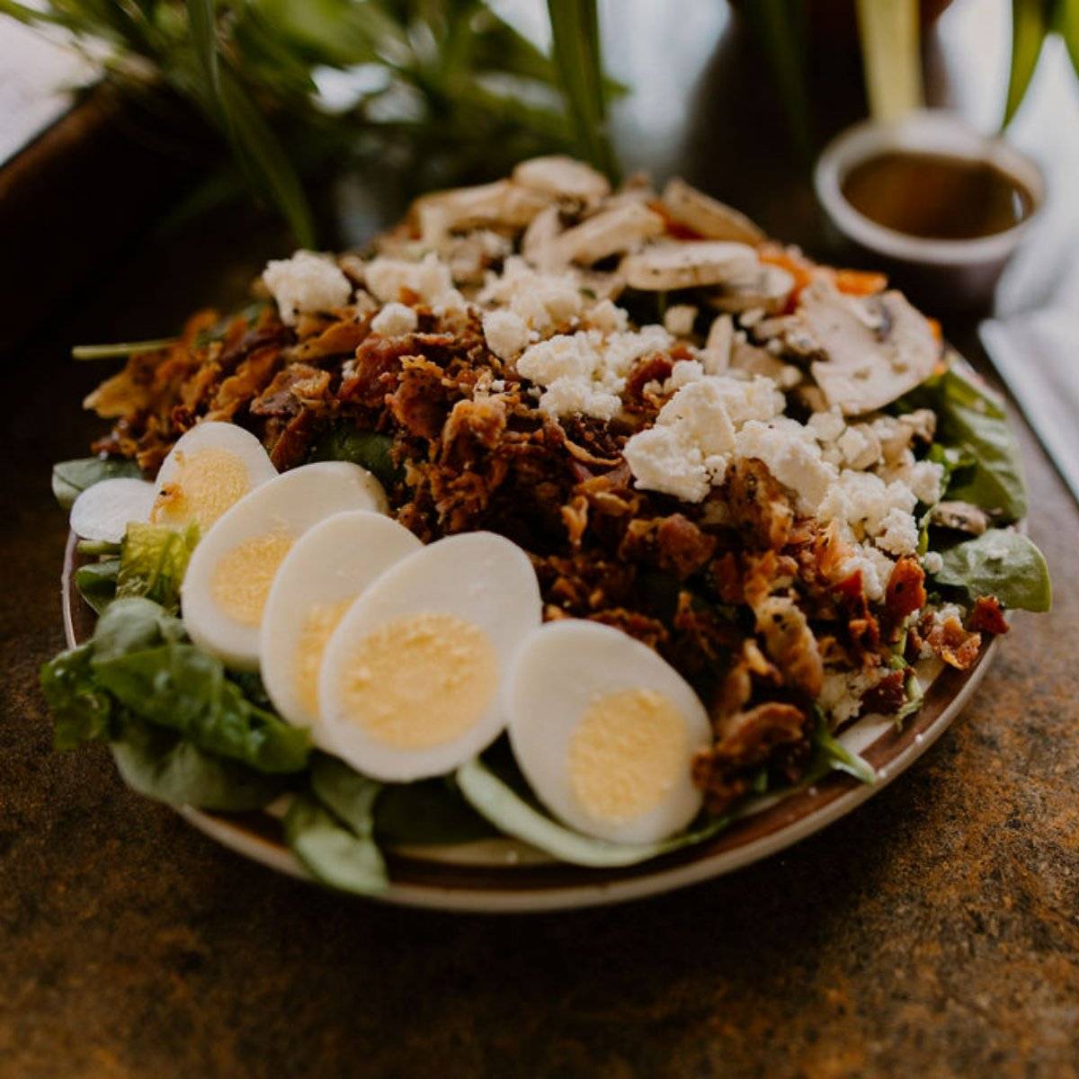 Not in the mood for pizza? A few bites of our mouthwatering bacon spinach salad is all it takes to fall in love with our other healthy choices. What's your favorite salad to have from us?