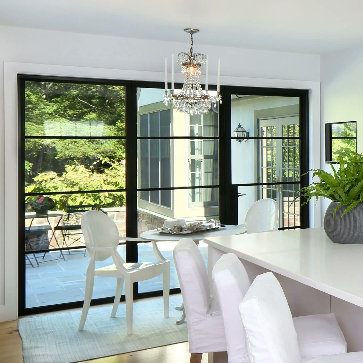 LasleyBrahaney's tweet photo. Black metal frame windows and doors make a bold statement in any space. #blackmetalframe #metaldoorframe #blackframe #exteriordoors #homerenovations #LasleyBrahaney #Princetondesignbuild https://t.co/gYW8s2FIHr
