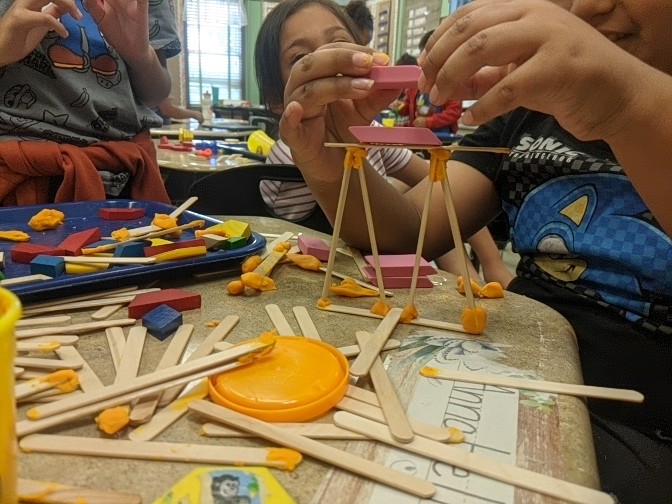 MrsMdoesSTEM's tweet photo. STEM Friday is back in 2nd grade! Today we used the Engineering Process to design, build, and test bridges that would hold the weight of five erasers using a variety of solid materials. So proud of my students and their teamwork and perseverance! https://t.co/MFnpYioOkx