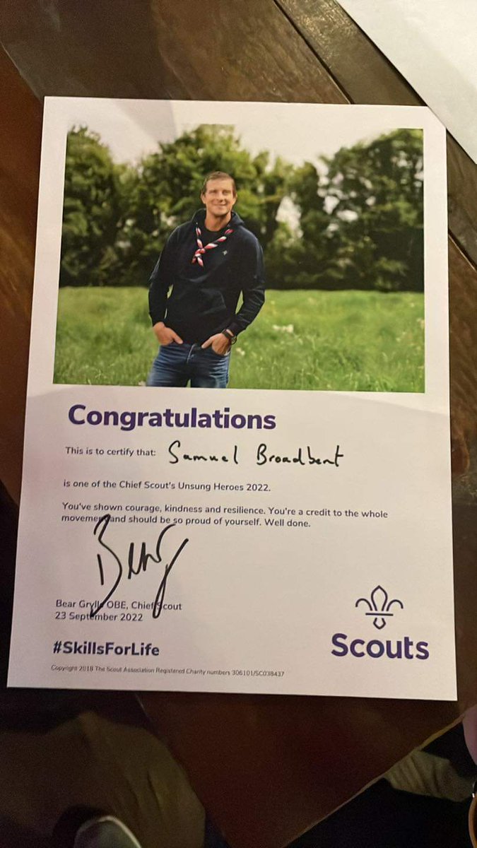 EnigmaExplorers's tweet photo. Congratulations to 1 of our Explorers, Sam, for being awarded the Chief Scout Unsung Heroes Award for the work he's been doing as a Young Leader. He has told us all about it this evening. He was really excited that @BearGrylls signed 'Scouting Super Hero' in Makaton to him. 1/2 https://t.co/hVqRl6Y9Z0