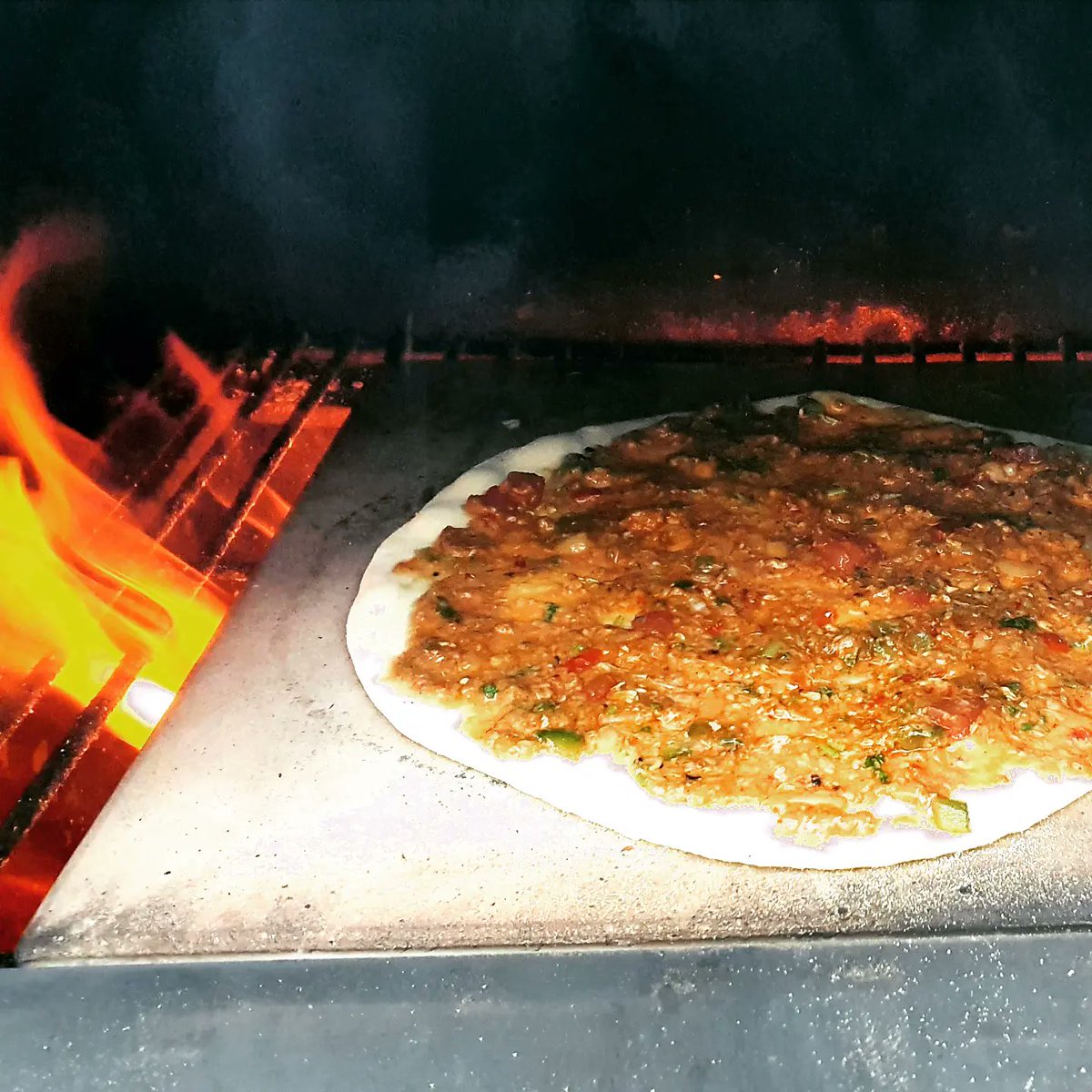 NickSmithFOB's tweet photo. Today we made Turkish lahmacun (a very thin pizza-like flatbread topped with spiced mince, and served as a wrap). It was a lot of fun, and received the nod of approval from my Turkish wife / co-director.
#lahmacun #woodfiredpizza #outdoorkitchen #turkishfood #fridaynightoff https://t.co/CgddySWwTj