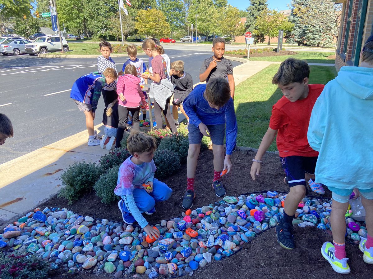 CBAWestChester's tweet photo. Fifth Grade added painted rocks to the CBA Rock Garden this afternoon. K-5th students each painted a rock for this beautiful garden started which was in 2017 #thinkkind #scribblestones #onlyatcba https://t.co/kWJAtiDoLm