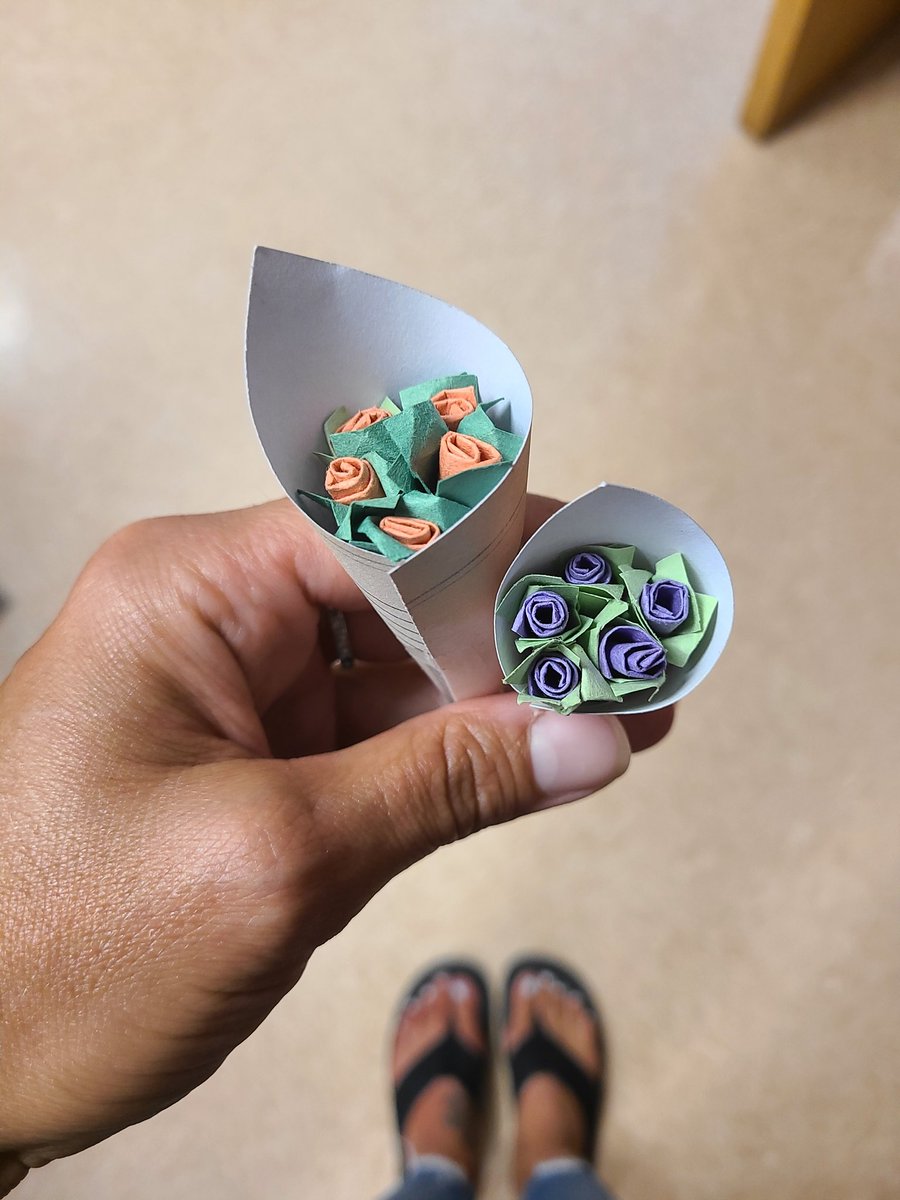 MrsRummenie's tweet photo. It's great to let your students know you're passionate about creativity! They wind up sharing their own art with you. Thank you for the flowers, Angelia and Semi! https://t.co/IuaVV06q0r