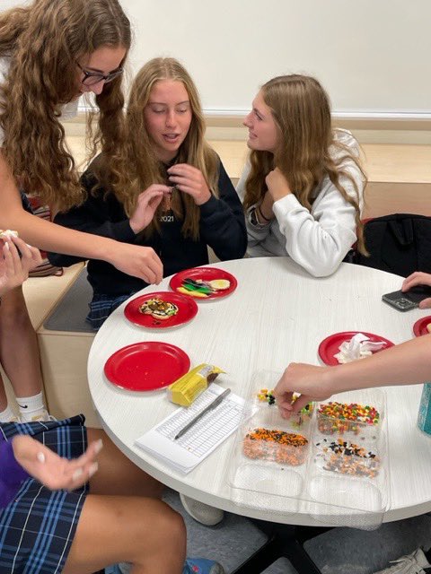 Johnson/ Saey family celebrating Friday by decorating some cookies!!