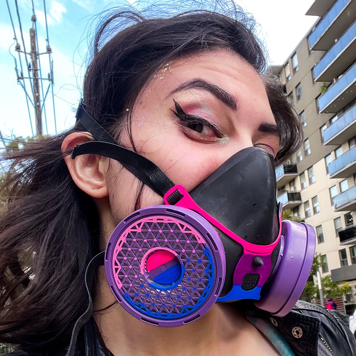 bellamiebeastly's tweet photo. A mask that flagrantly expresses my queerness AND provides protection; what the heck is up. Happy Bisexual Visibility Day 💖💜💙
(P100 elastomeric respirator from @DentecSafety, painted with Posca paint markers and Angelus neon leather paint, still in progress) https://t.co/AJ1GgX9RUu