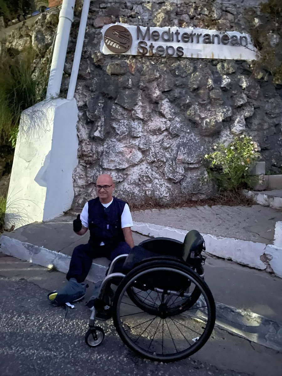 GBCNewsroom's tweet photo. Eris Rowbottom was seen off on Saturday morning by a group of supporters and Minister @cortes_john as he started his Med Steps Challenge.

Eric has been in a wheelchair since the age of eight when he contracted Polio. This had never allowed him to visit the Med Steps site before https://t.co/PgQIEuCuPP