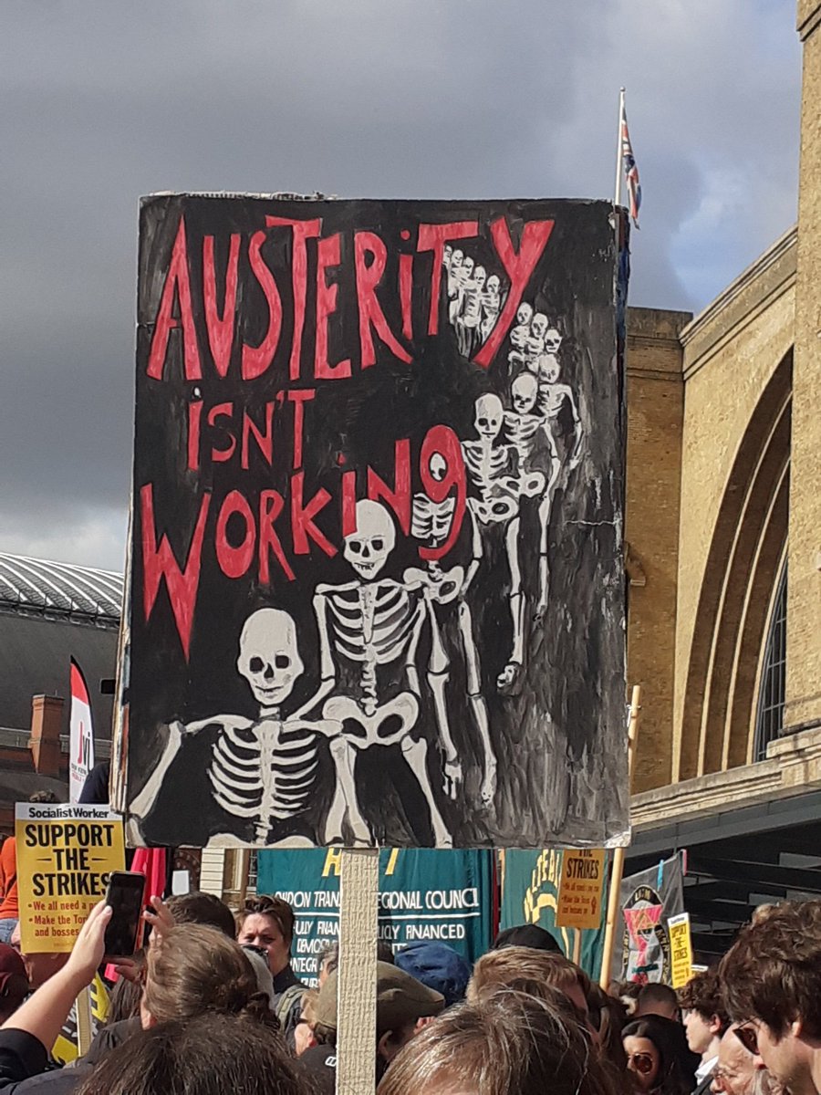 SECSC2014's tweet photo. #EnoughIsEnough #SupportRailWorkers #StandByYourPost Haunting placard today. We will not accept austerity to paraphrase Mick Lynch RMT Union leader speaking at King's Cross rally https://t.co/0fccr36bm1