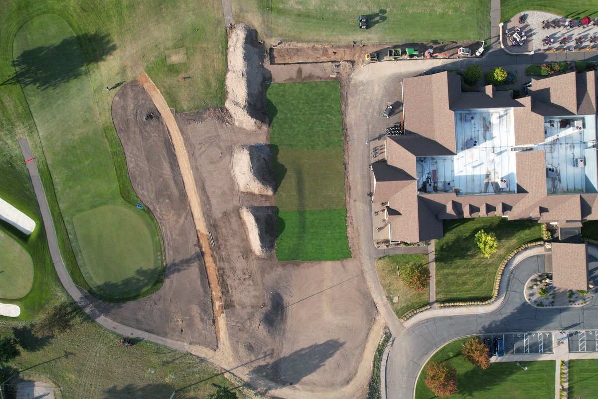 somersetturf's tweet photo. A lot of flowetry happening as @EggertSeth says. Huge @midlandhillscc @MD_Ries @tina_rosenow staff and @hartmanco effort to get almost 10K of PG sod down. New synthetic range tee construction under way as well https://t.co/LTGAlcDtTd