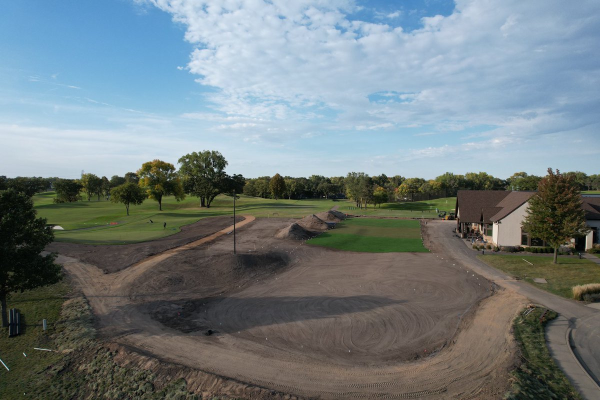 somersetturf's tweet photo. A lot of flowetry happening as @EggertSeth says. Huge @midlandhillscc @MD_Ries @tina_rosenow staff and @hartmanco effort to get almost 10K of PG sod down. New synthetic range tee construction under way as well https://t.co/LTGAlcDtTd