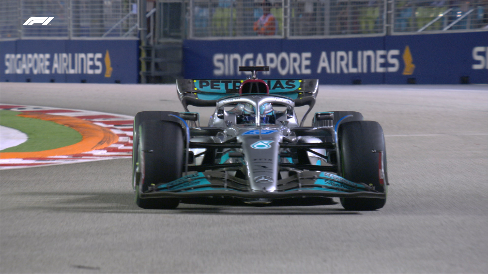 George Russell of Mercedes drives through the first corner at Singapore, after being knocked out i Q2