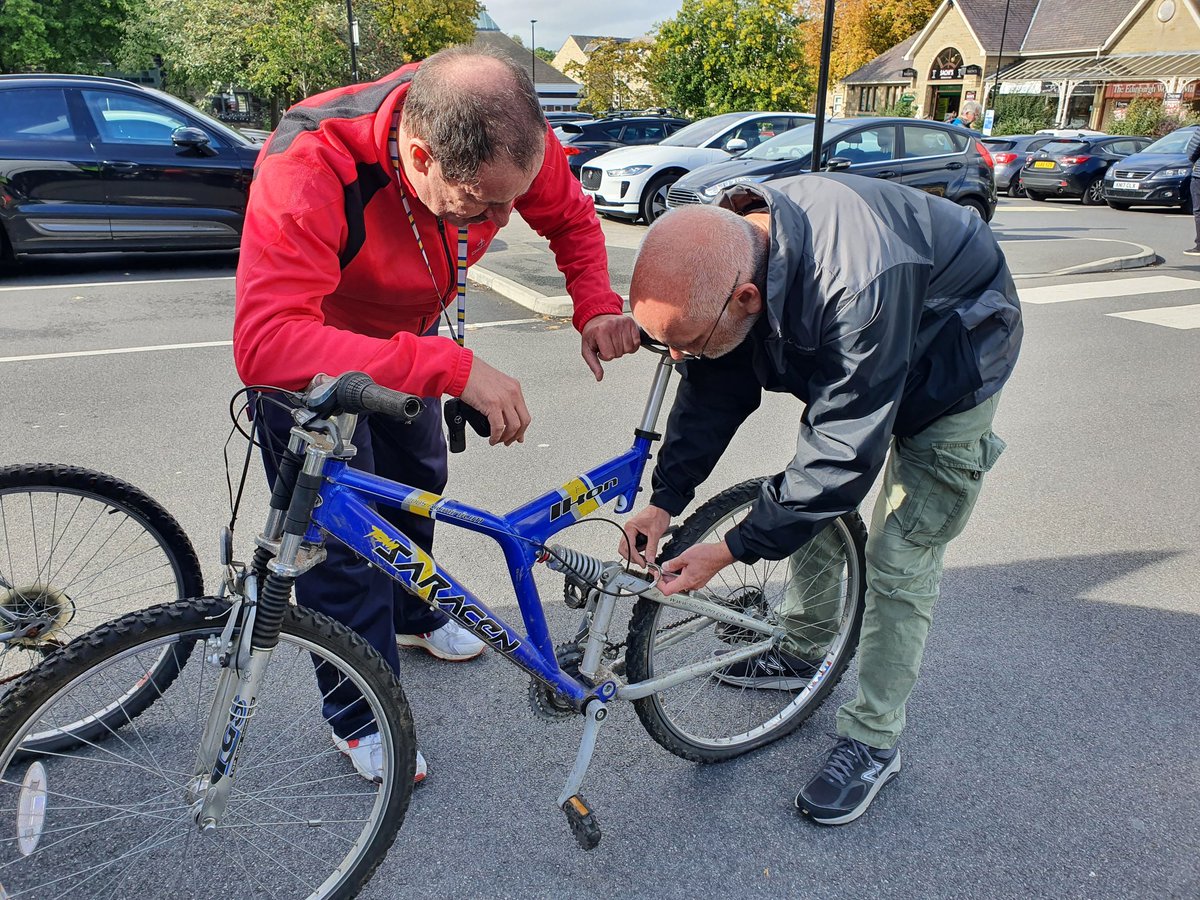 Busy day collecting bikes but always a bit of time for some impromptu training..quick lesson from Miles on how to adjust brakes.