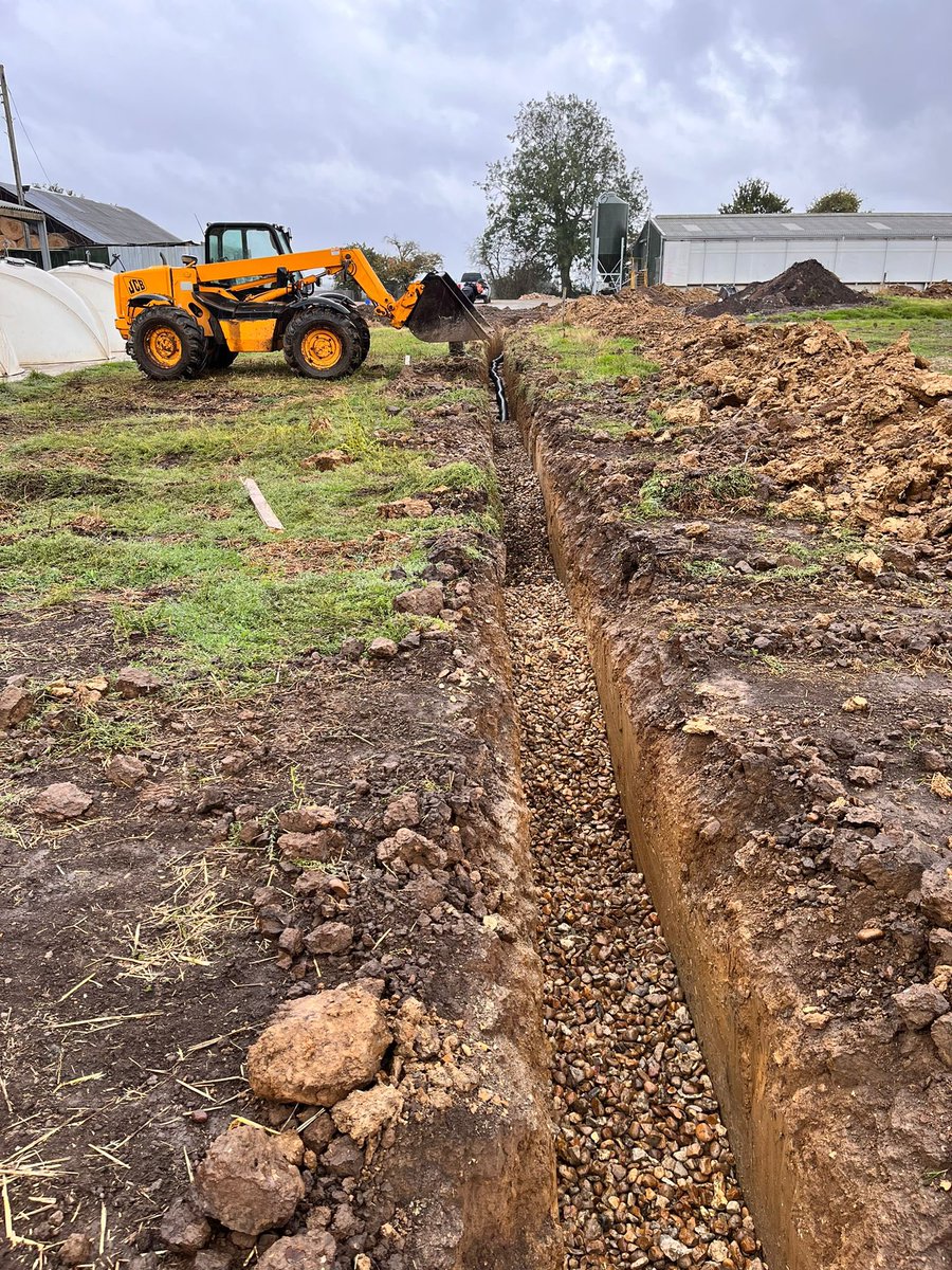 groundsfarm's tweet photo. Drainage improvement going on the last few days. New pipe going in across the yard to pick up all the other land drains and get water to the right place https://t.co/7shFtV4Ivj