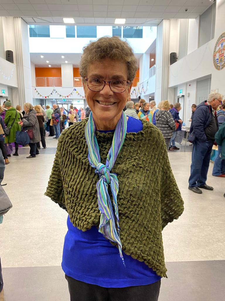 Happy owner of a new Nielanell cape at the #ShetlandWoolWeek Maker's Market today. 

We're at Anderson High School til 4pm