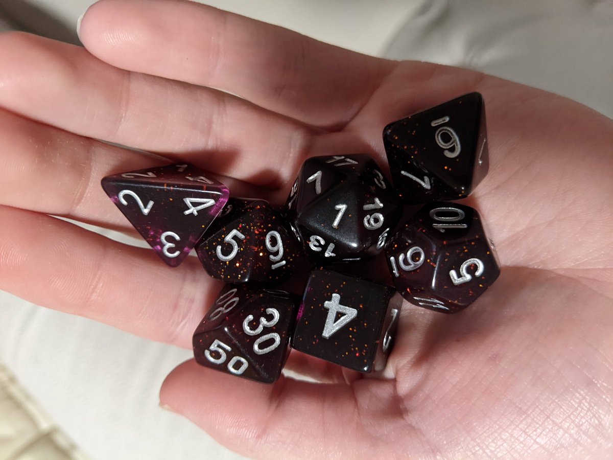 wittyxwitch's tweet photo. So ready for @JessoLaurus Dice-tober!! 

The red ones were a little hard to photograph because they always look like something else, but I promise the glitters are red! https://t.co/GvvbUaUAtd