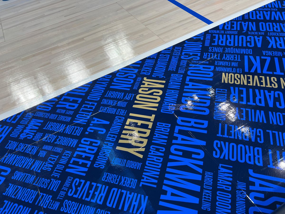 MavsFansForLife's tweet photo. The Dallas Mavericks new court this season… Navy blue border, paint and half-court logo. Royal blue names of all the players who have played for the franchise with the championship team player names in gold. https://t.co/8Wr7LdtoZP