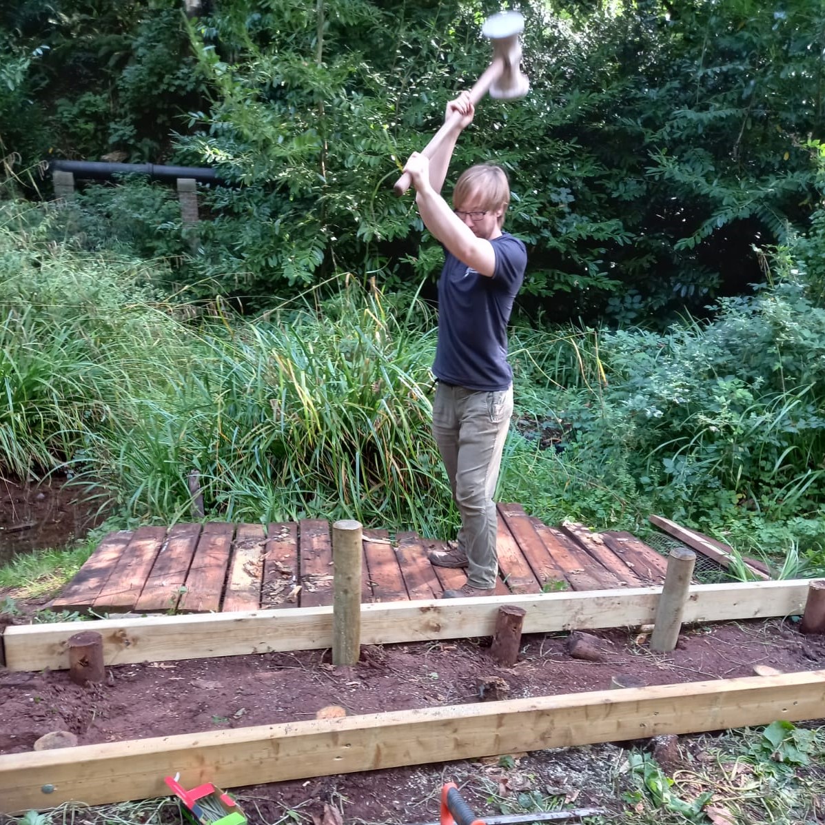 CockingtonPark's tweet photo. Our rangers have been in the Cockington Water Meadows this week fixing a section of collapsed boardwalk. This is a popular walk that meanders through meadows and woodland, connecting Cockington to the coast.

#countrysiderangers #cockingtonwatermeadows #footpathmaintenance https://t.co/Z5kFQKyhbN