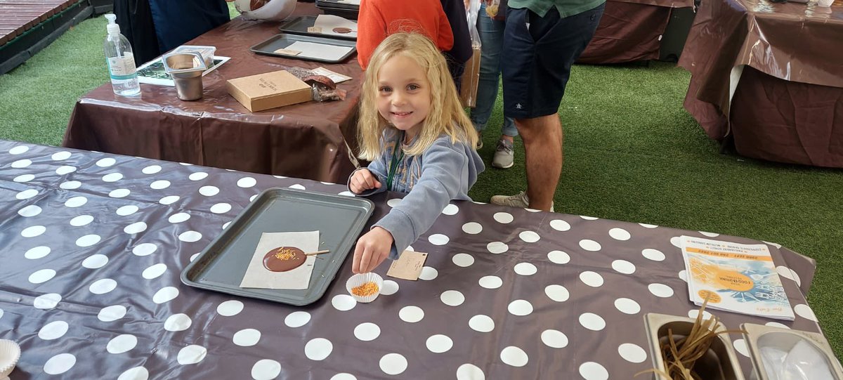 A happy customer with her chocolate lollipop from @YorkCocoaWorks - find them for free Food Factory activities at Coppergate with more at Museum gardens!