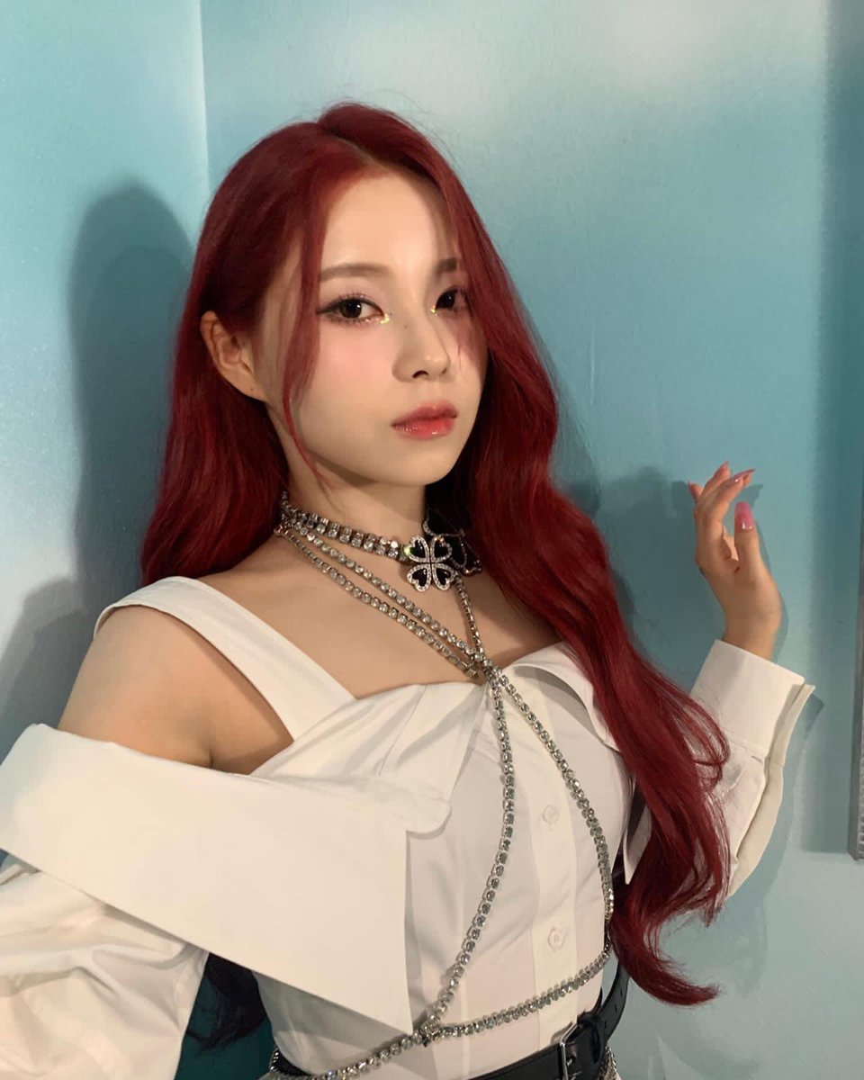 nmixxkyujn's tweet photo. The lady loves is in the corner’s room party, flaunting her enchanting white dress and her so pretty lit red hair. The party isn't over yet, so come closer and let we have to spread our charm by walking gorgeously and dancing prettily. This red baby will bring you to the idyll. https://t.co/UJkW888GEM