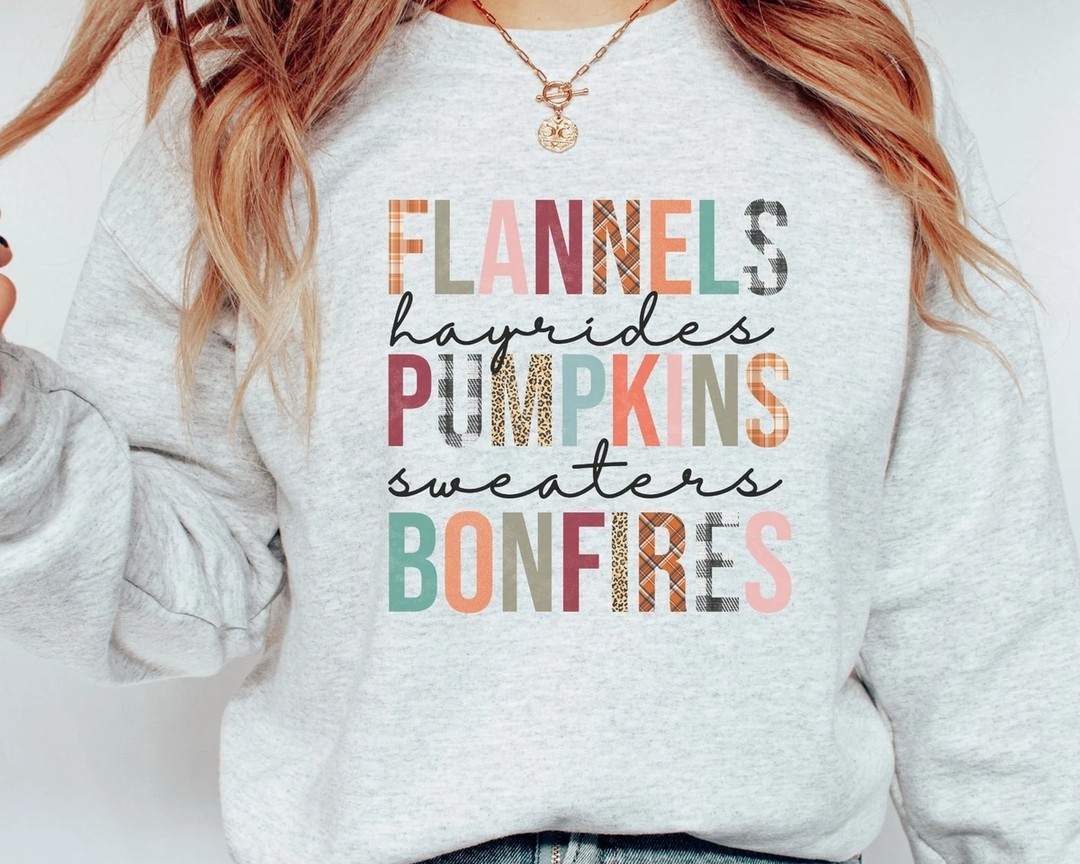 What's more fall than a flannel, a pumpkin and a bonfire?