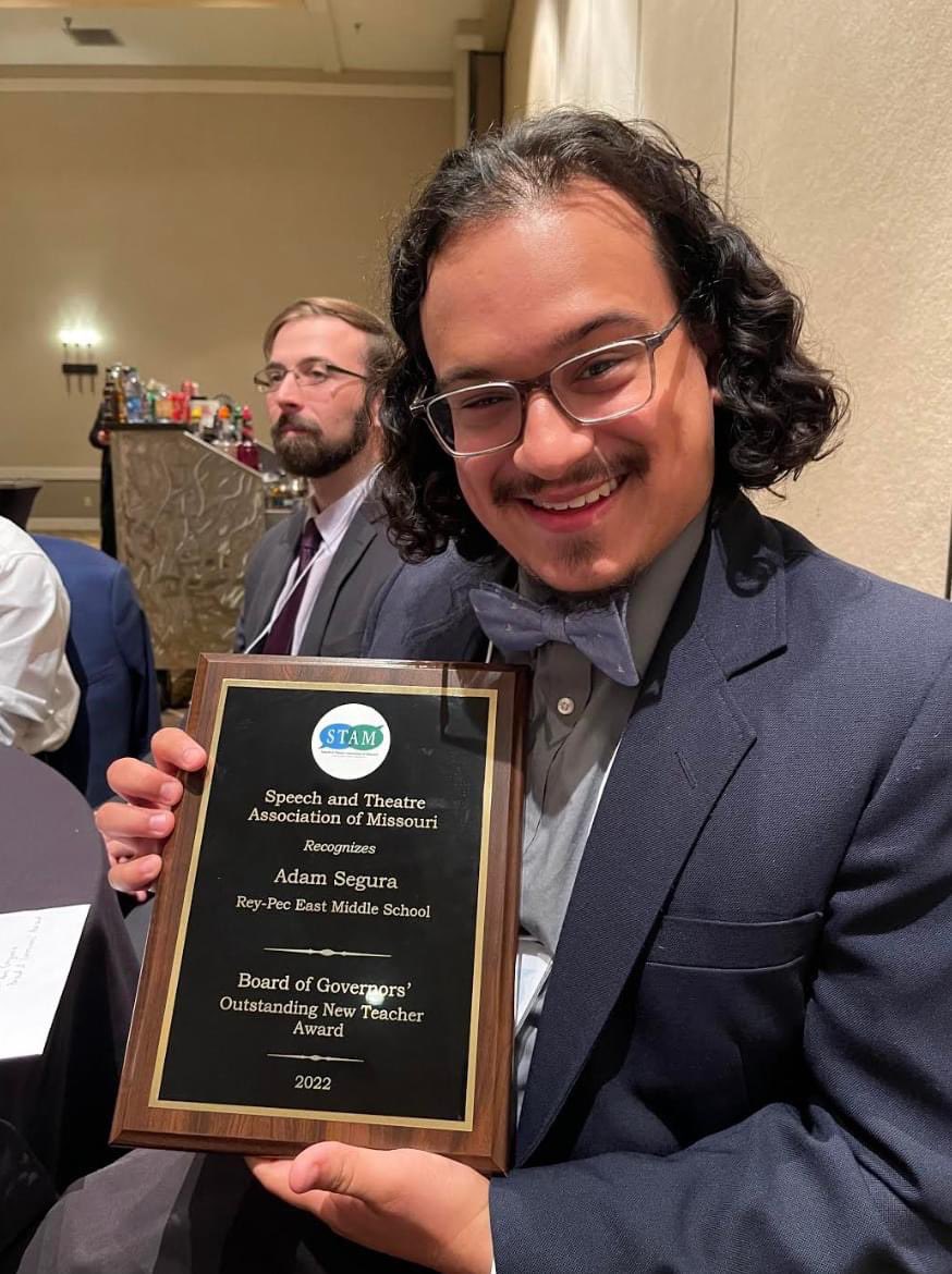 raypecschools's tweet photo. Adam Segura, @rpemshuskies theatre teacher, won the Speech and Theatre Association of Missouri's Outstanding New Teacher Award! Congratulations, Mr. Segura! #huskypackpride #owningthestage #raypec #forwardandbetter https://t.co/67oZ5lvePB