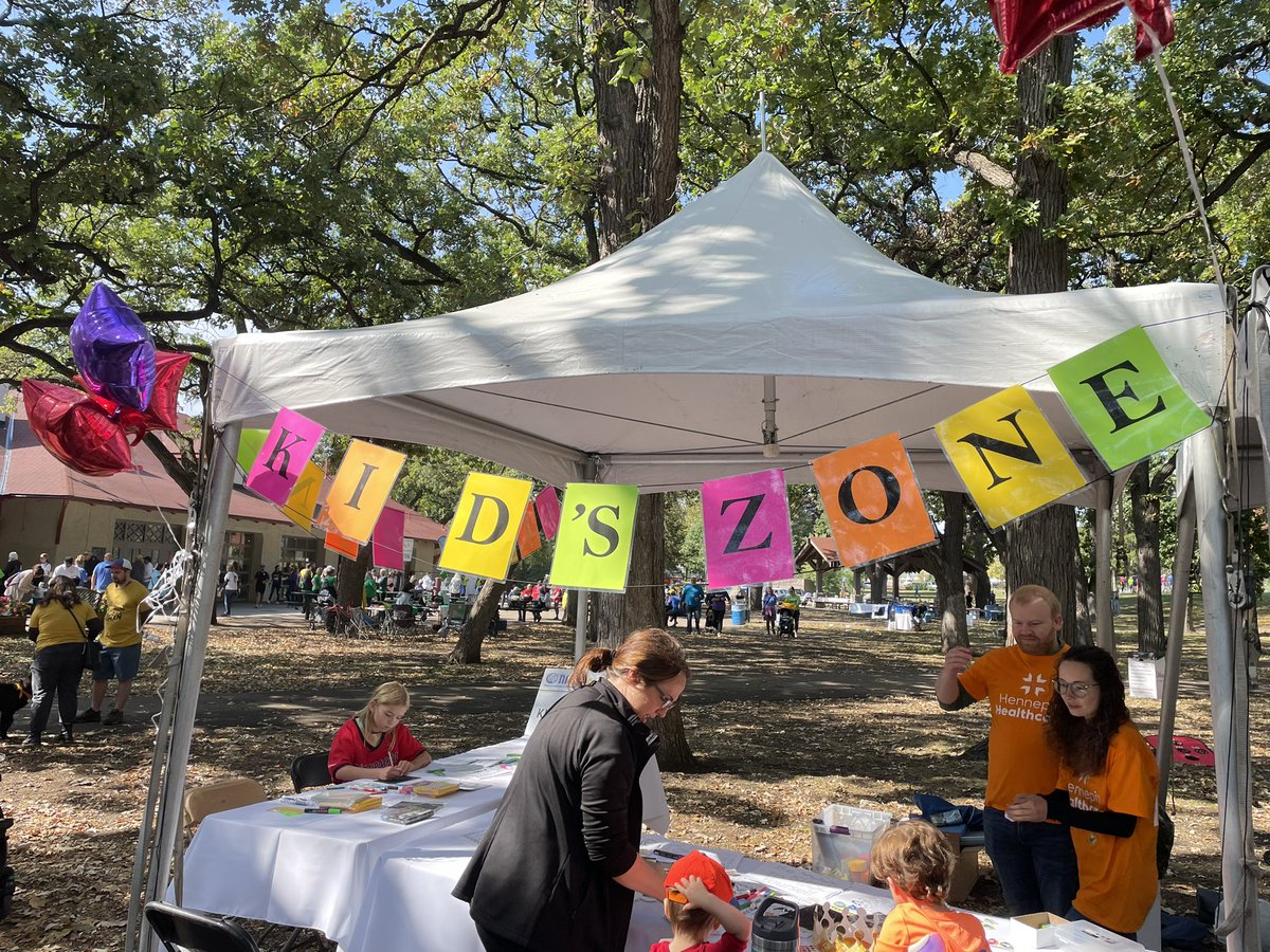 NAMIMinnesota's tweet photo. Hennepin Healthcare sponsored the Kid’s Tent again this year, full of crafts, face painting, and giggles. The International Reggae All-Stars offered great tunes while teams picnicked in the Park. #Together4MH #NAMIMN https://t.co/zTdM3svQhZ https://t.co/cYnP5J5vrg