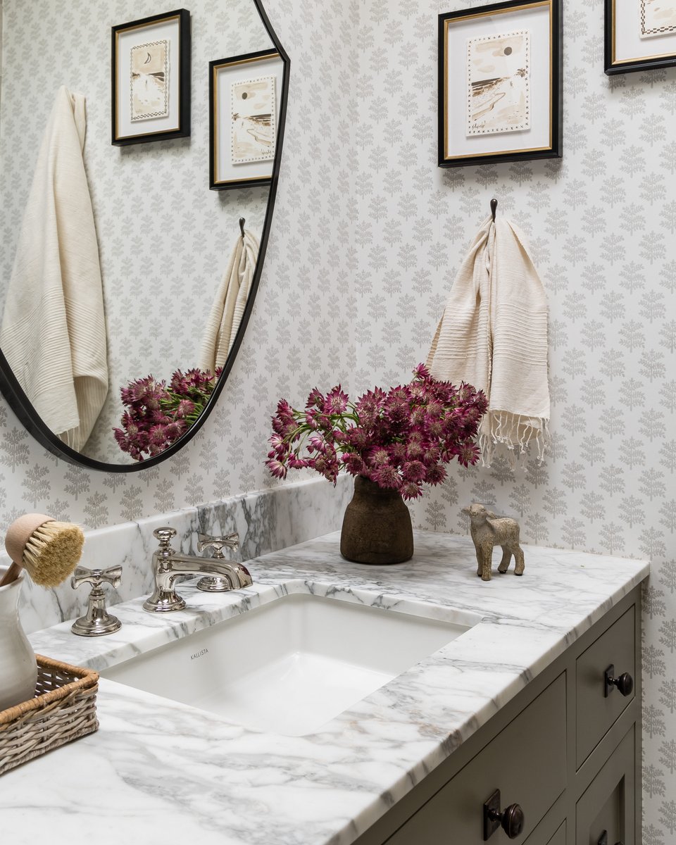 Mindygayerdesign giving this bathroom remodel so much character and style.

Countertops: White Carrara Marble bit.ly/3AP4Bxx