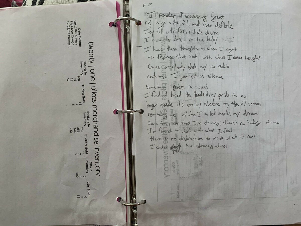 TylerOnceSaid's tweet photo. Tyler Joseph's high school 3-ring binder with the handwritten lyrics for Car Radio on one side (spot the curse word) and the twenty one pilots merch inventory on the other. This boy had a dream, and now this man is living it. 😭 https://t.co/Tf1tuZtdgX