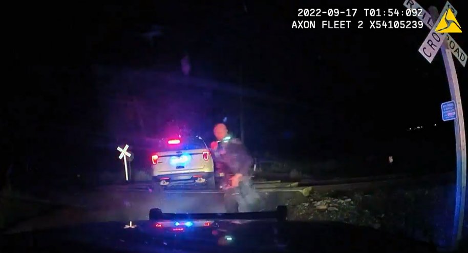 azfamily's tweet image. GRAPHIC: Woman hit by train while in police cruiser parked on tracks: bit.ly/3Su2Hsd