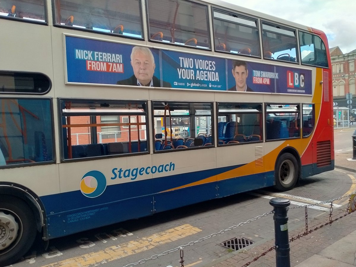 andrewmcminn's tweet photo. In Carlisle bus station there is is a bus with @LBC advertising - complete with pictures of @NickFerrariLBC and @TomSwarbrick1 https://t.co/bbJYFhTcC8