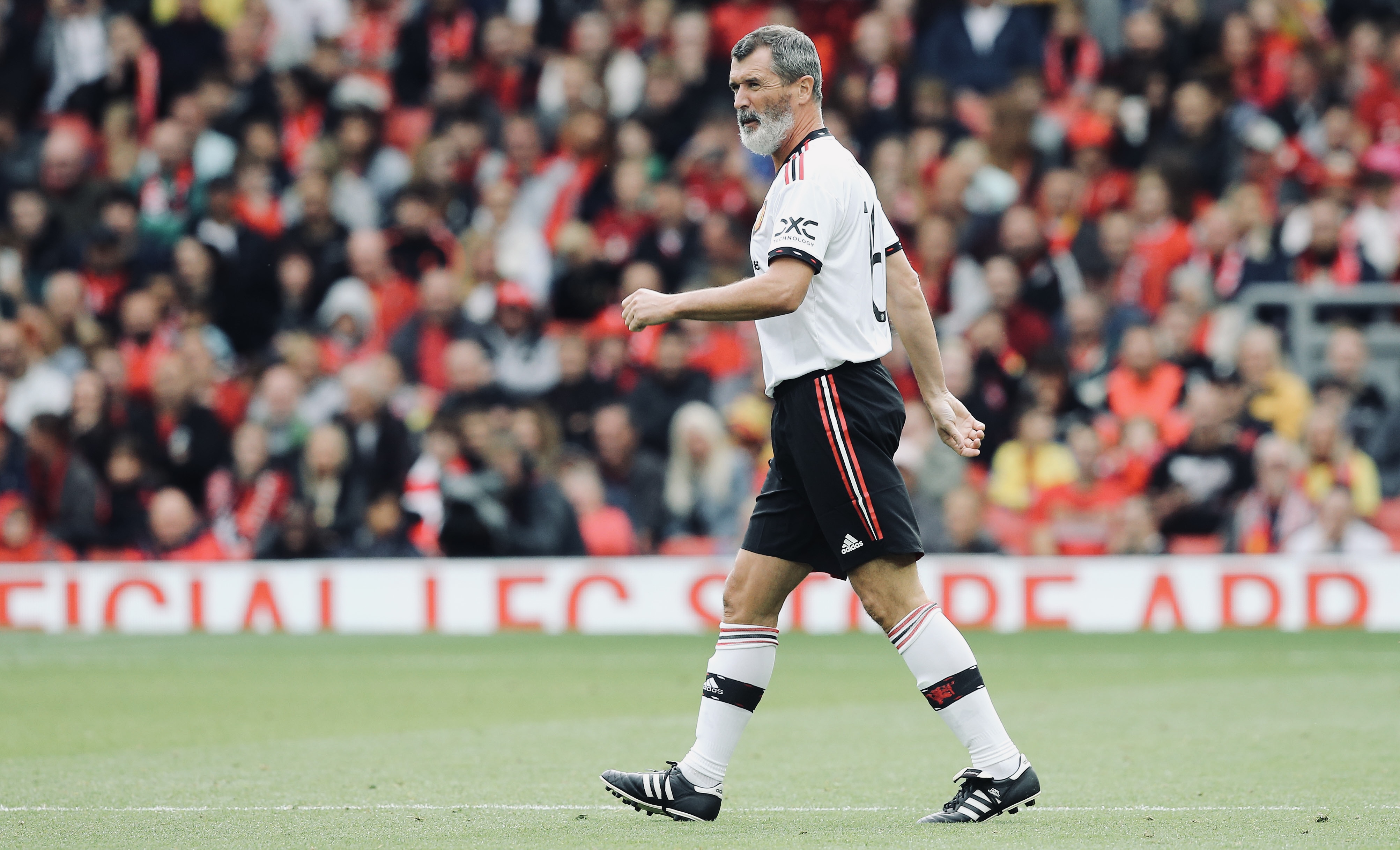 Roy Keane in action for United during the Legends of the North fixture at Anfield.