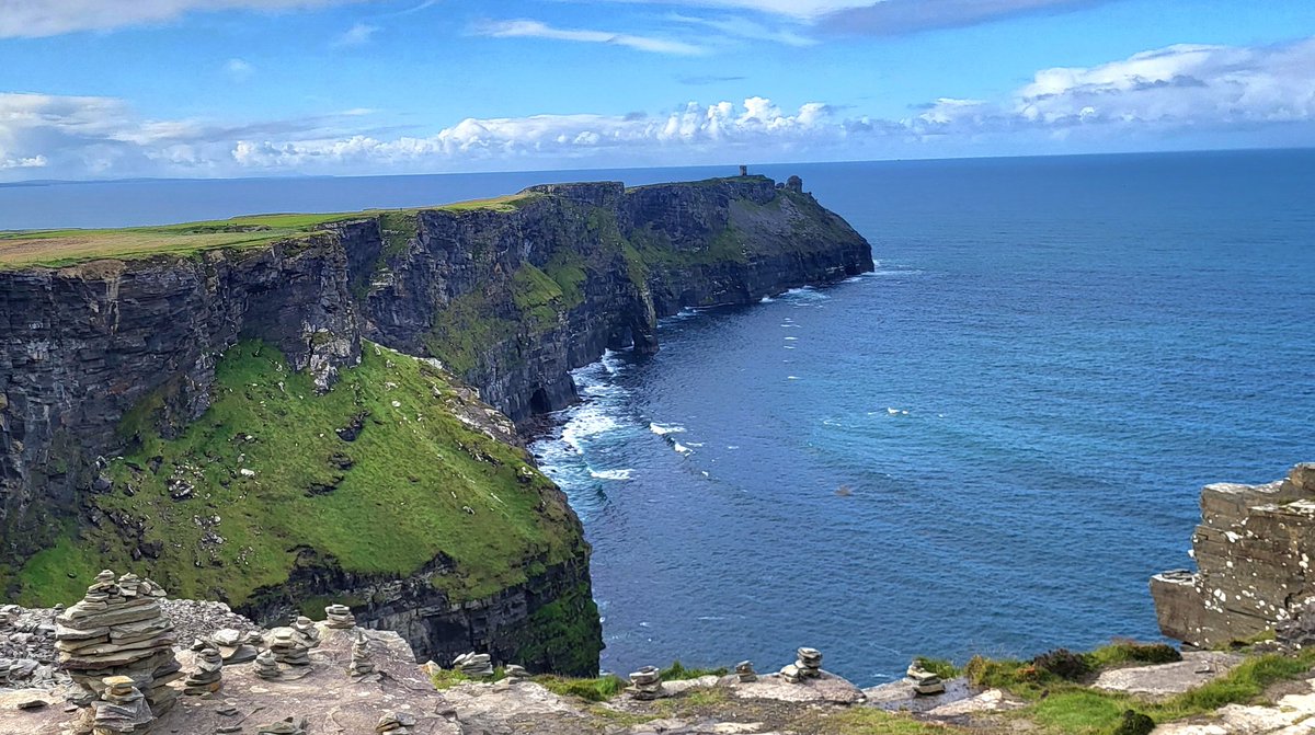 Looking South, along the Cliffs of Moher, towards Hags head and the Napoleonic era watchtower built there. County Clare, Ireland.