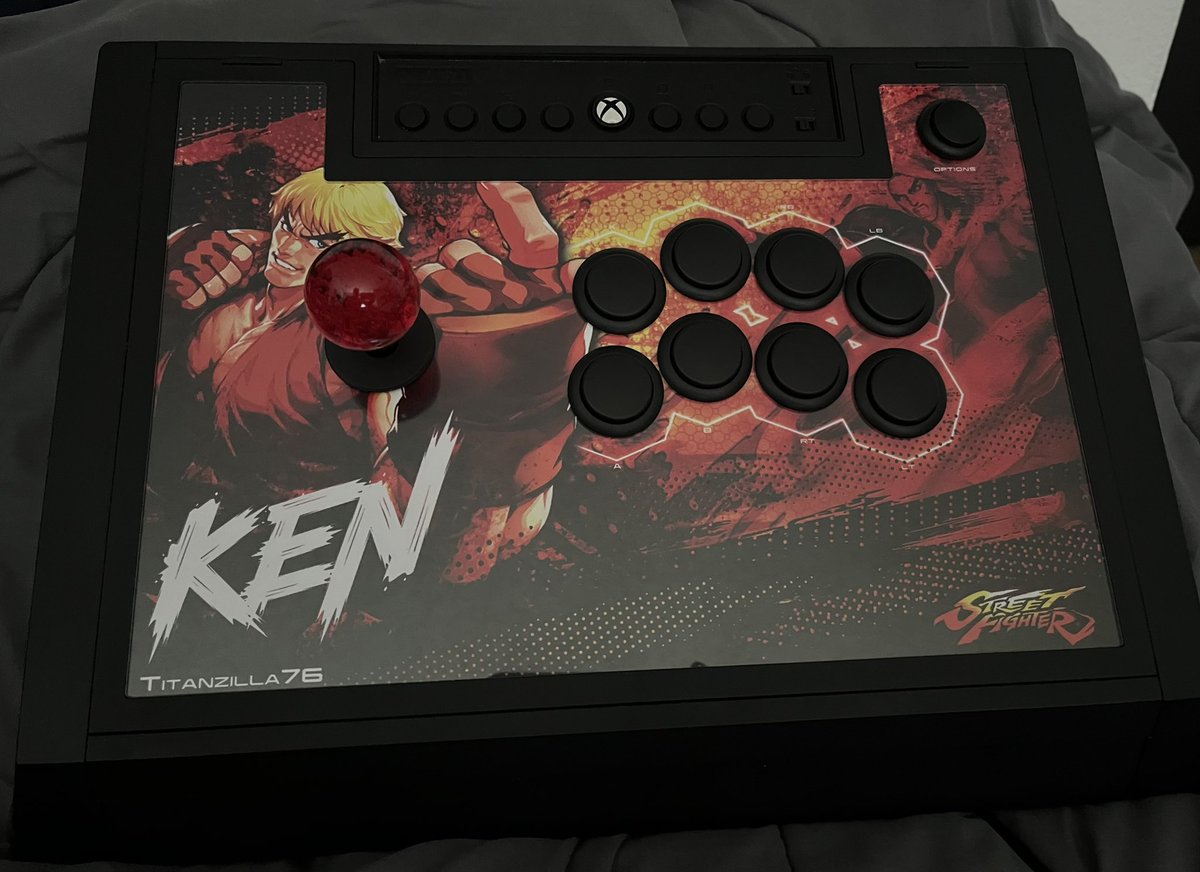 Titanzilla76's tweet photo. My @horiusainc Fight stick alpha. Art work by Carlos Martinez at @TheArcadeStick and printed out by @focusattack . https://t.co/loGegSPn27