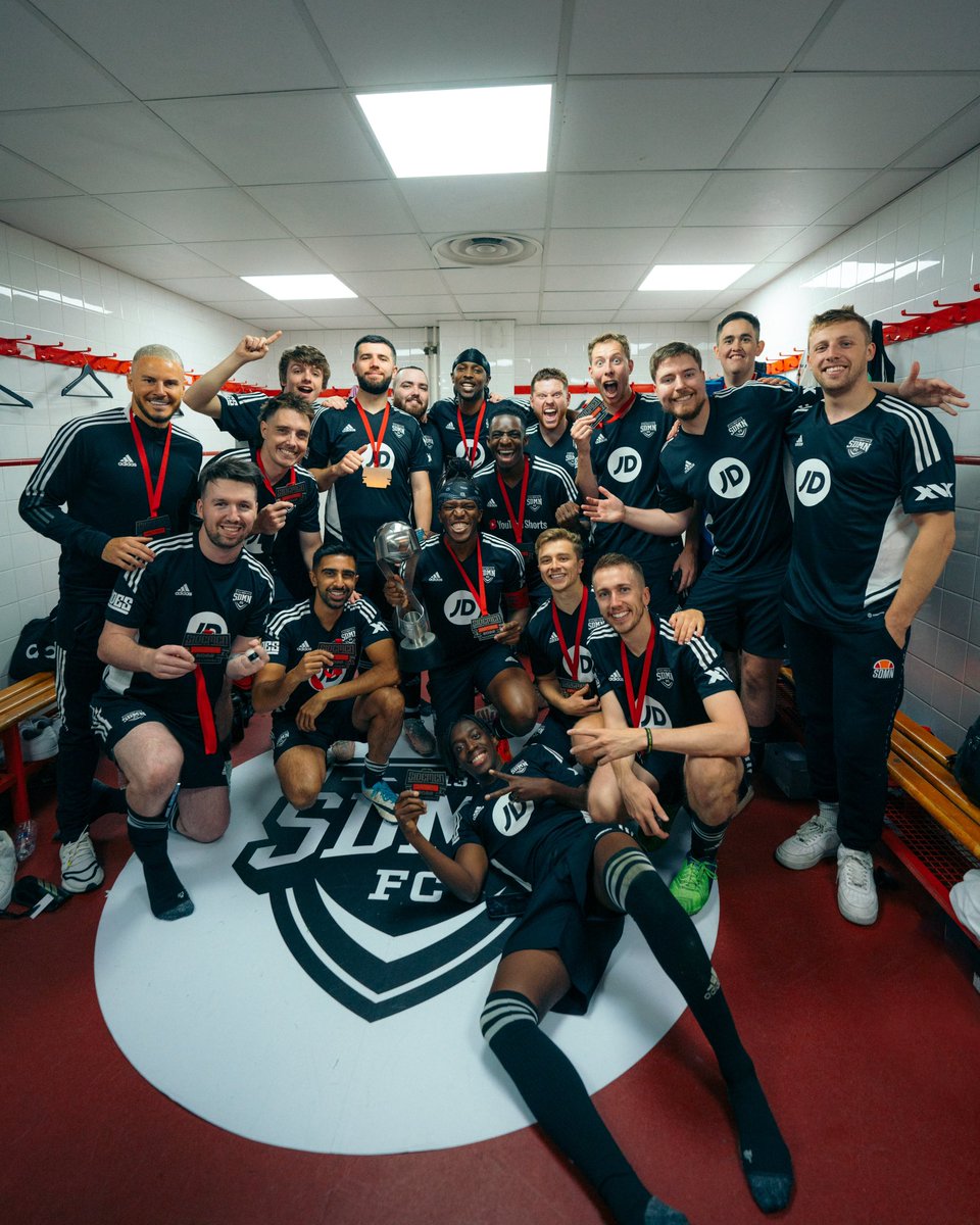 Photo: SIDEMEN Celebrating with Charity Match Trophy.
