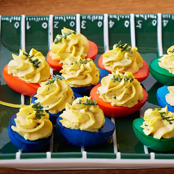 IowaEggCouncil's tweet photo. Whether it's a high school team, a college team, or your favorite pro team, get everyone eggcited for football games with these colorful deviled eggs! Find the recipe at https://t.co/MReImyDcSQ. 🏈🥚🎉 #football #halftimesnacks #incredibleeggs https://t.co/1nz3gU9ZCJ