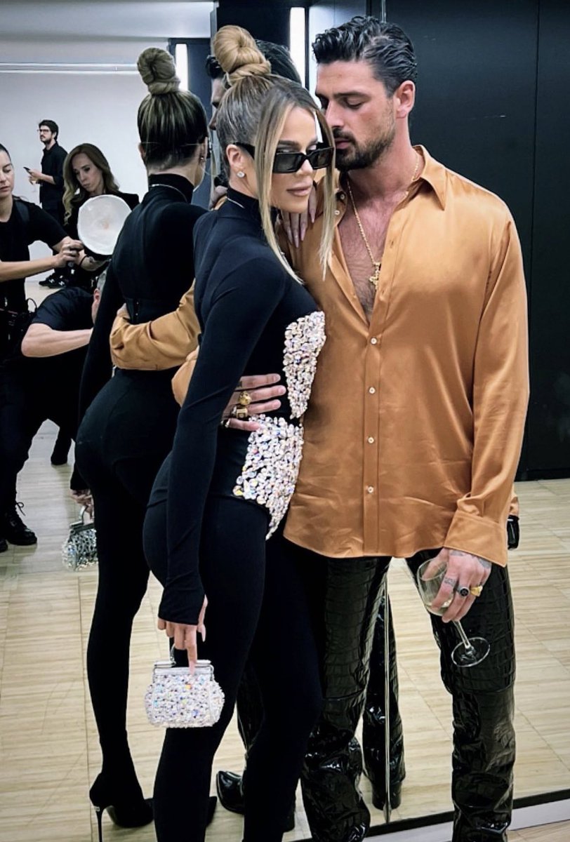 Khloé Kardashian and Michele Morroneat at the Dolce & Gabbana fashion show in Milan.