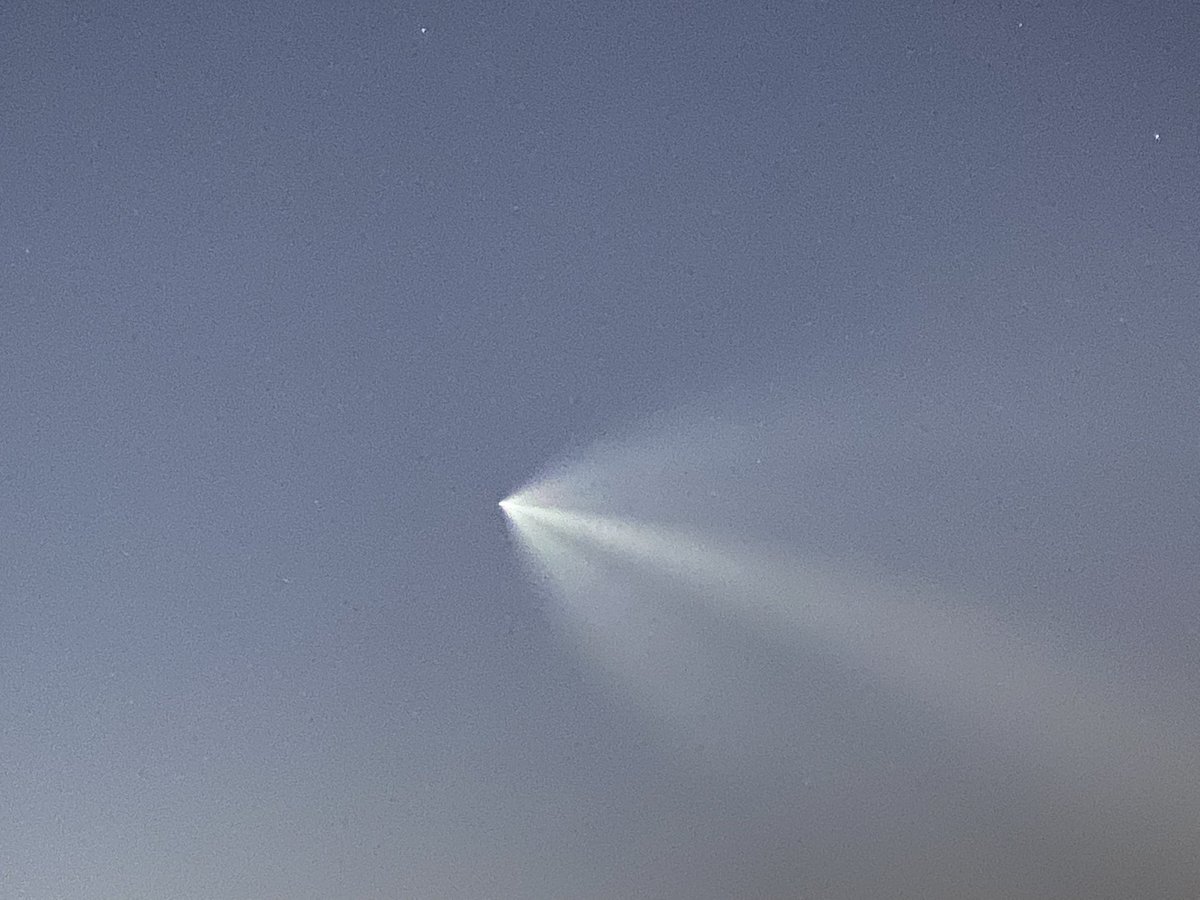 ami_sark's tweet photo. Re entry of the @SpaceX Falcon 9 rocket 1073-4 as seen from the NY metro area. Pic taken at 740pm ET , 8 minutes after it’s launch at 732 pm ET from Cape Canaveral, FL. It had launched 52 Starlink satellites &amp;  was descending to land on a drone ship in SC ~650 miles south of us. https://t.co/zL5z1B3DSk