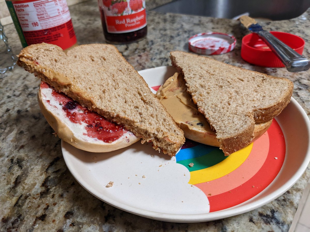 CNFannon's tweet photo. Toddler asks for PB&amp;J. I make him one. He's screaming &amp; sobbing because I did it wrong. He wanted 2 different kinds of bread. The depravity you see below finally appeased him. Those are blueberry bagels in the bottom. https://t.co/8FGkaCXYDb